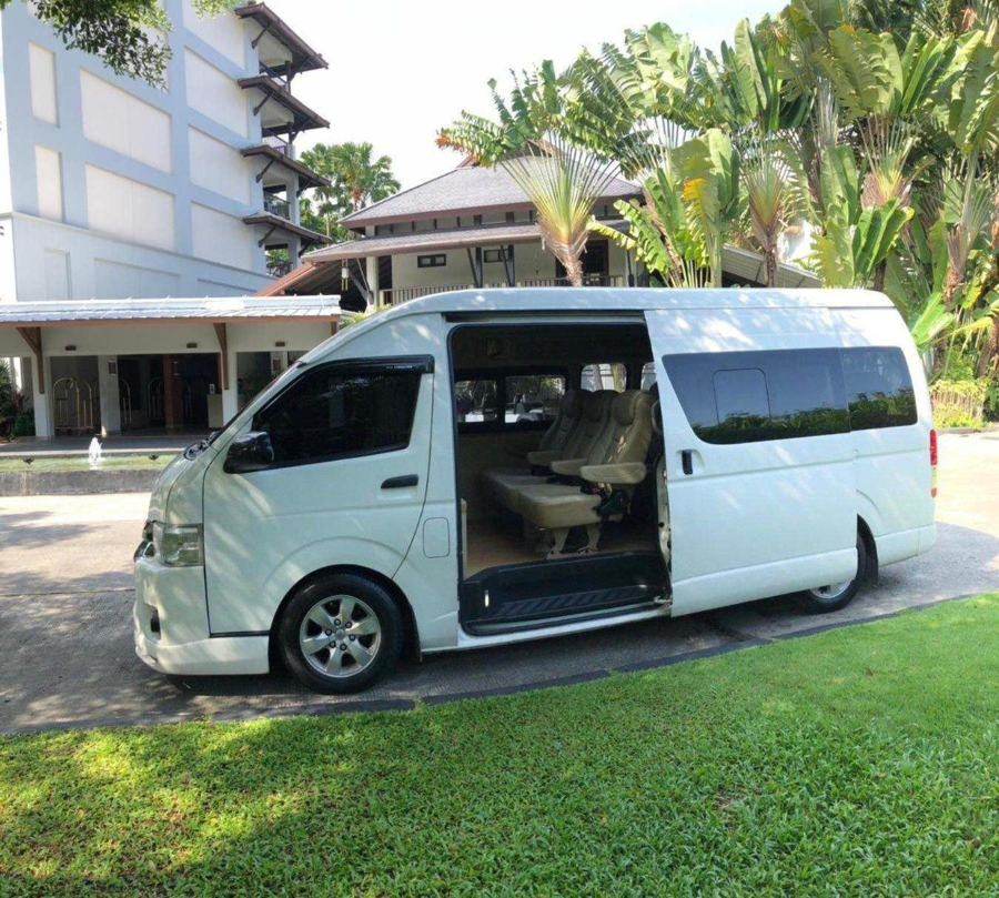 Akim's white VIP van