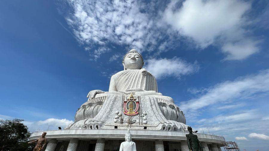 The Big Buddha in Phuket under a blue sky